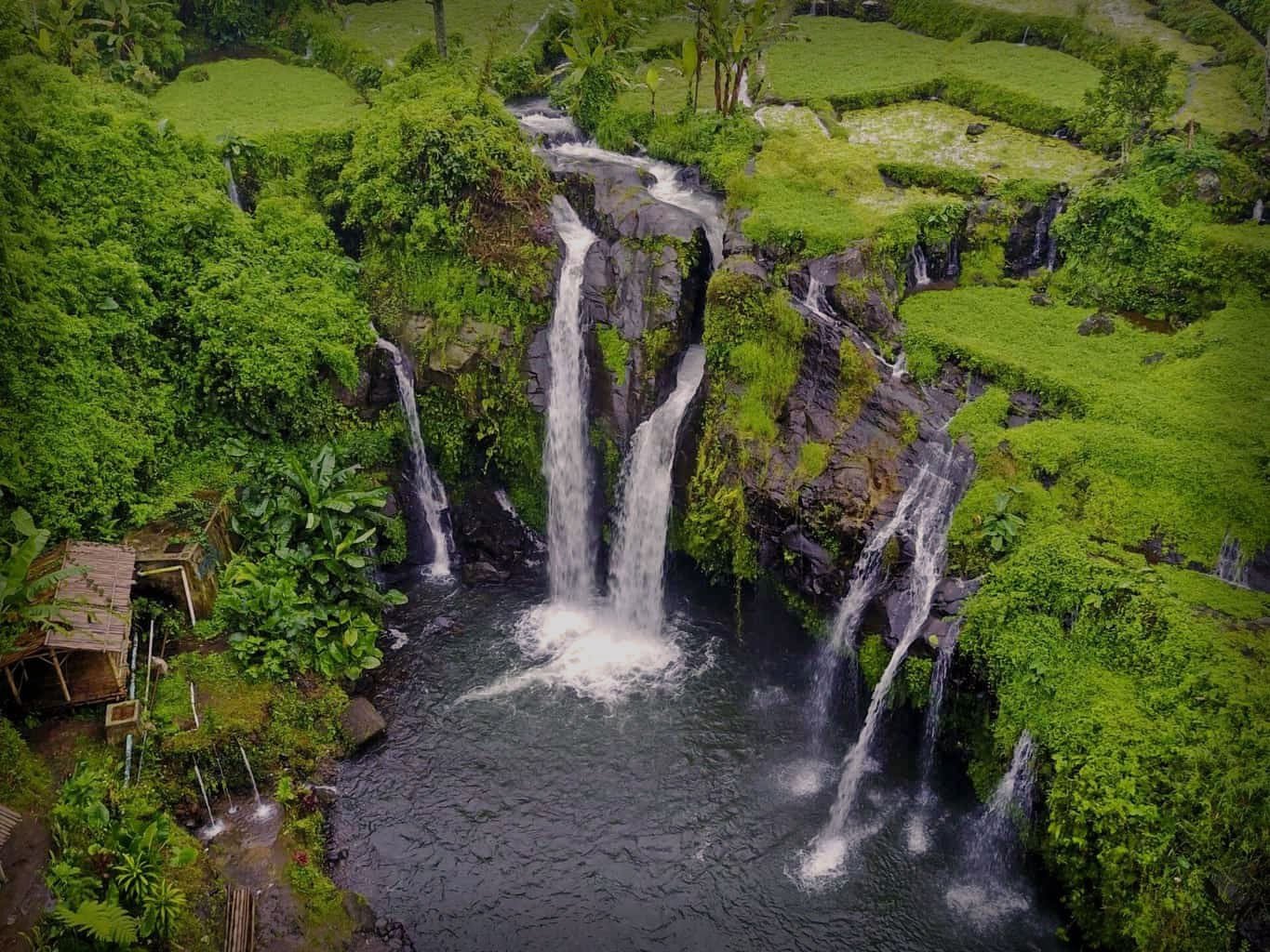 Wisata air terjun kembar arum